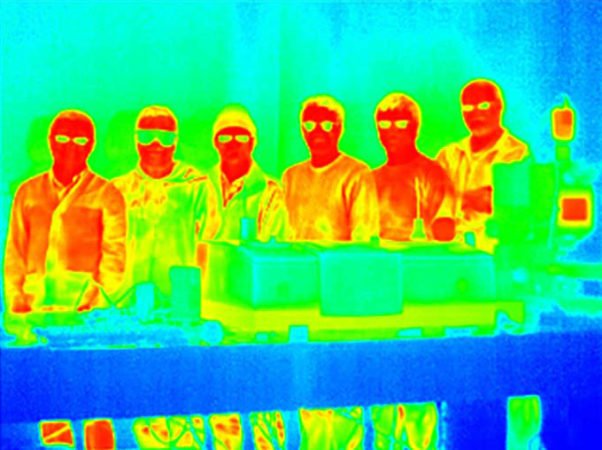 Hotter objects like people typically appear brighter in infrared images. A team of researchers (some members shown) has developed a coating that may work as camouflage from infrared cameras, although it doesn’t yet operate at temperatures relevant for hiding humans.COURTESY OF THE KATS GROUP